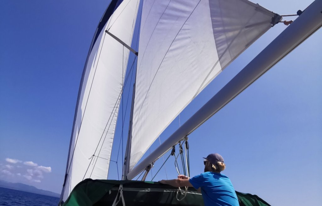 Heading North under sails.