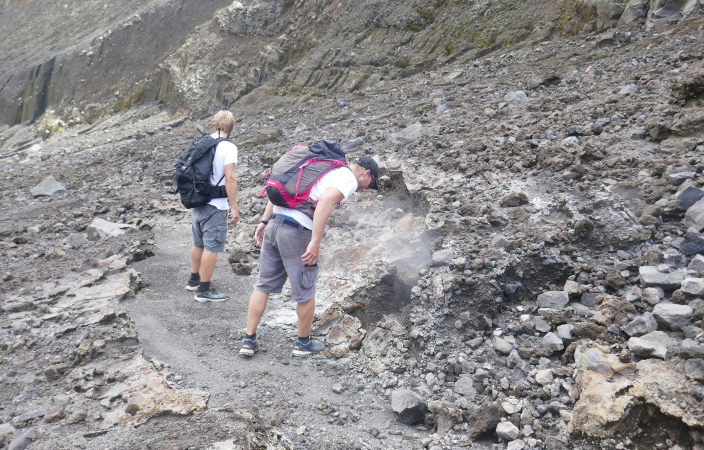 Steam is rising out of the stones.
