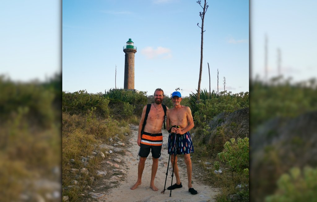 father and son, and a lighthouse.