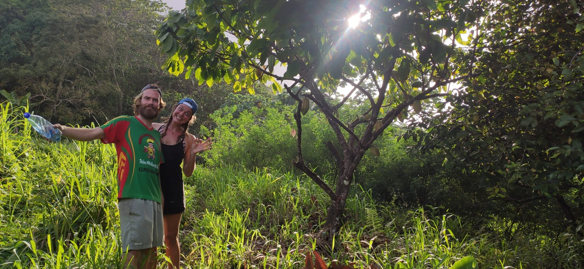 Captain, Capitana and the cocoa tree.