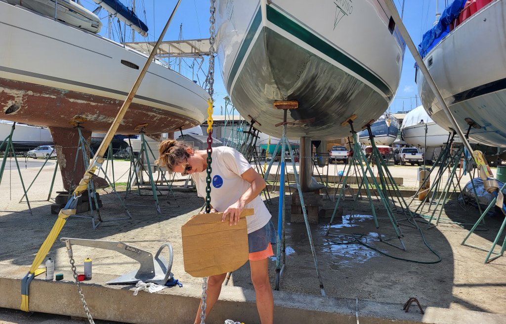 Boat work: mark anchor chain.