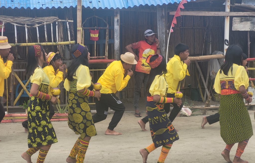 They play the traditional flutes and do a traditional dance.