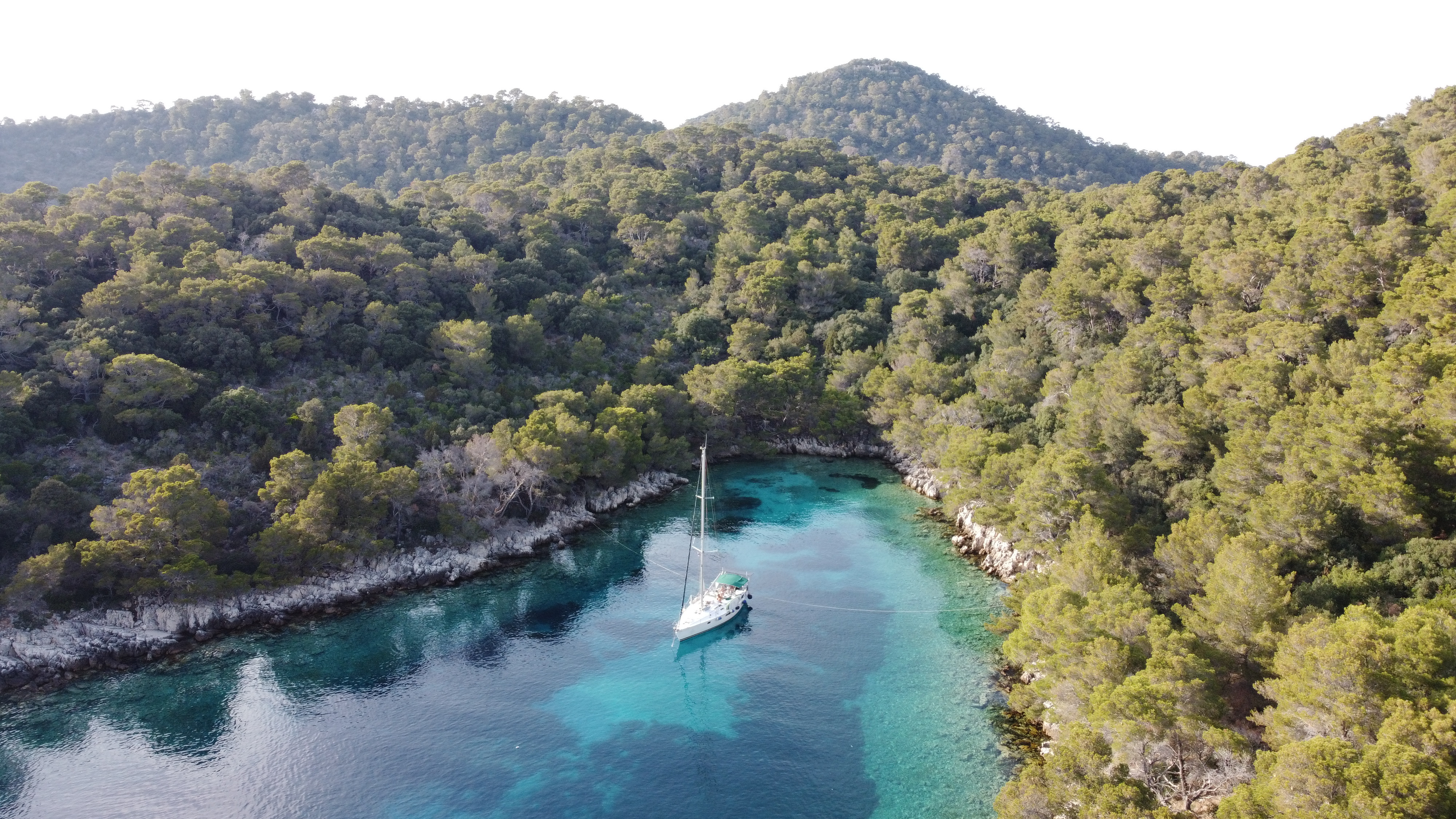 Achoring with shore lines in a bay of Lastovo.