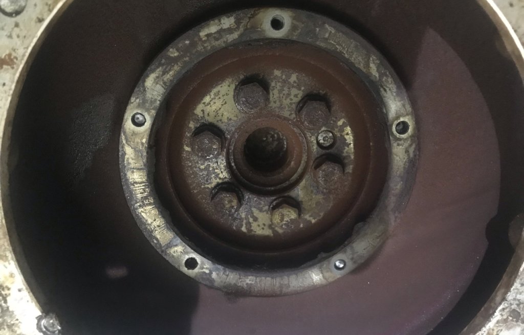 Broken bolts inside of flywheel.